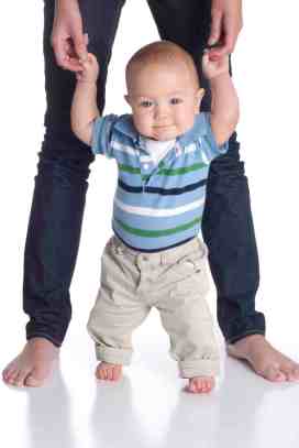 baby walking with mother small