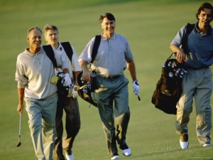 four-men-walking-on-a-golf-course