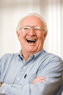 stock-photo-7776807-laughing-senior-man-portrait